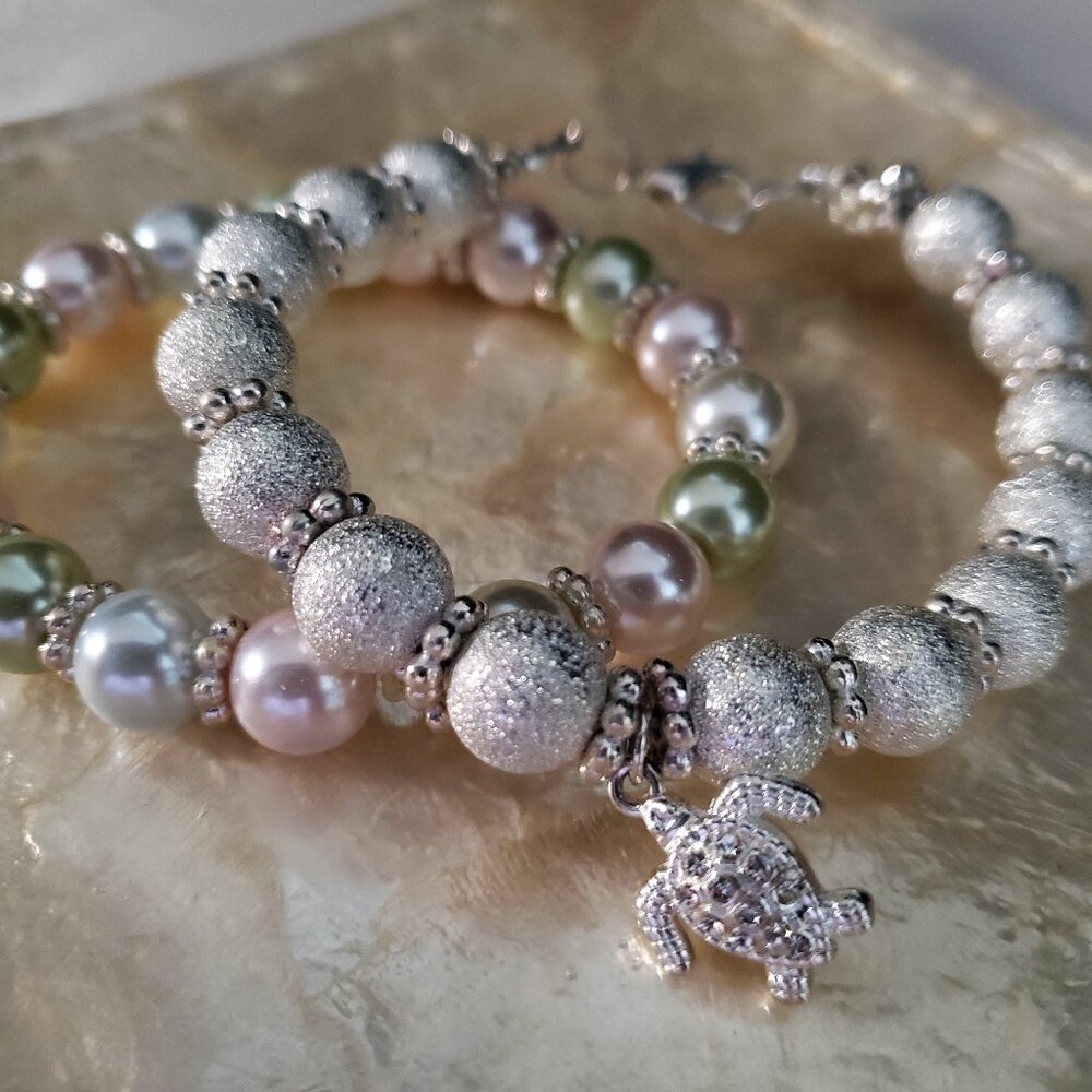 Shiny disco ball bracelet with turtle